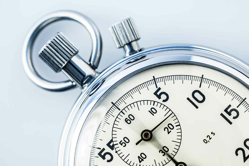 closeup of a stopwatch with a moving hand